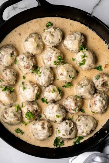 Homemade Swedish Meatballs are seared and smothered in creamy gravy. Comforting, delicious, and so much better than IKEA meatballs. | aheadofthyme.com