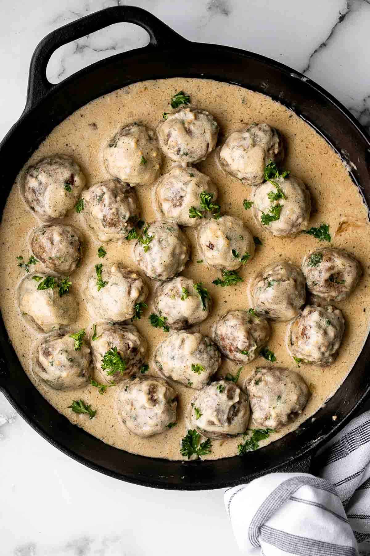 Homemade Swedish Meatballs are seared and smothered in creamy gravy. Comforting, delicious, and so much better than IKEA meatballs. | aheadofthyme.com