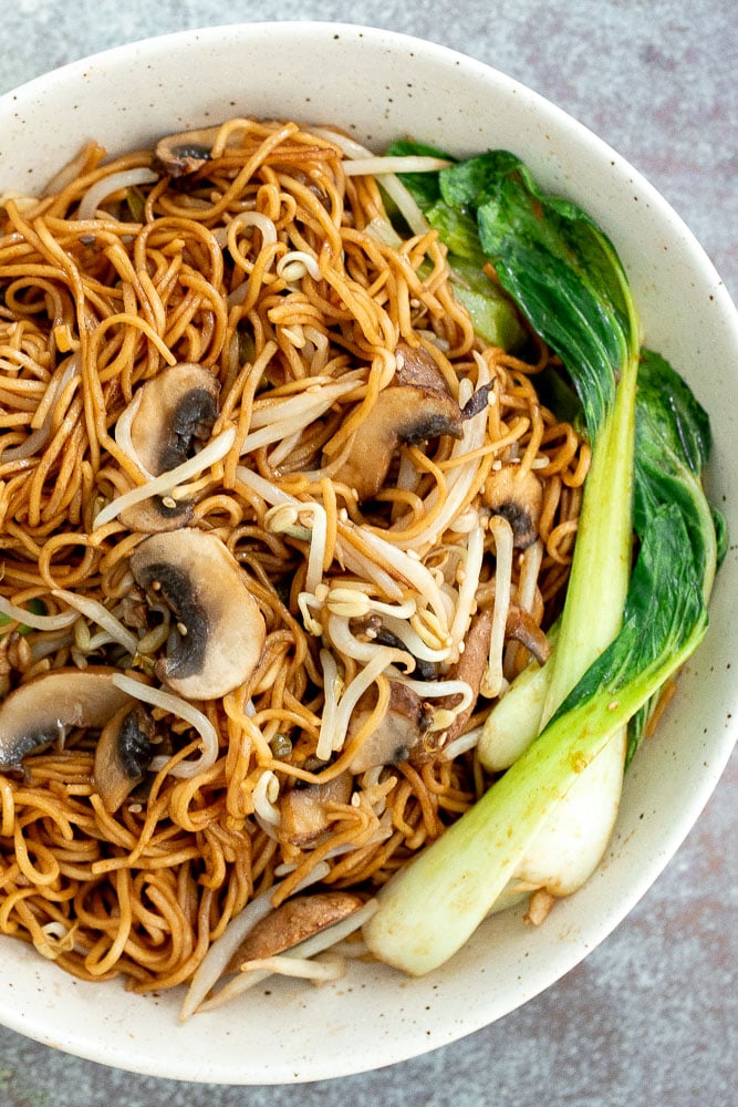 Better than takeout, quick easy stir-fried vegetarian chow mein is packed with vegetables and coated in a delicious savoury sauce. Make it in 15 minutes. | aheadofthyme.com