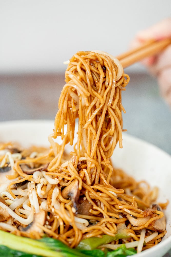 Better than takeout, quick easy stir-fried vegetarian chow mein is packed with vegetables and coated in a delicious savoury sauce. Make it in 15 minutes. | aheadofthyme.com