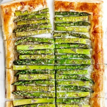 Asparagus tart with Gruyère cheese, a balsamic glaze, and flaky puff pastry, is a flavourful and delicious addition to brunch this spring season. | aheadofthyme.com