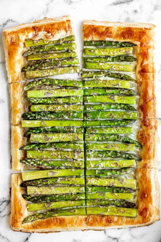 Asparagus tart with Gruyère cheese, a balsamic glaze, and flaky puff pastry, is a flavourful and delicious addition to brunch this spring season. | aheadofthyme.com