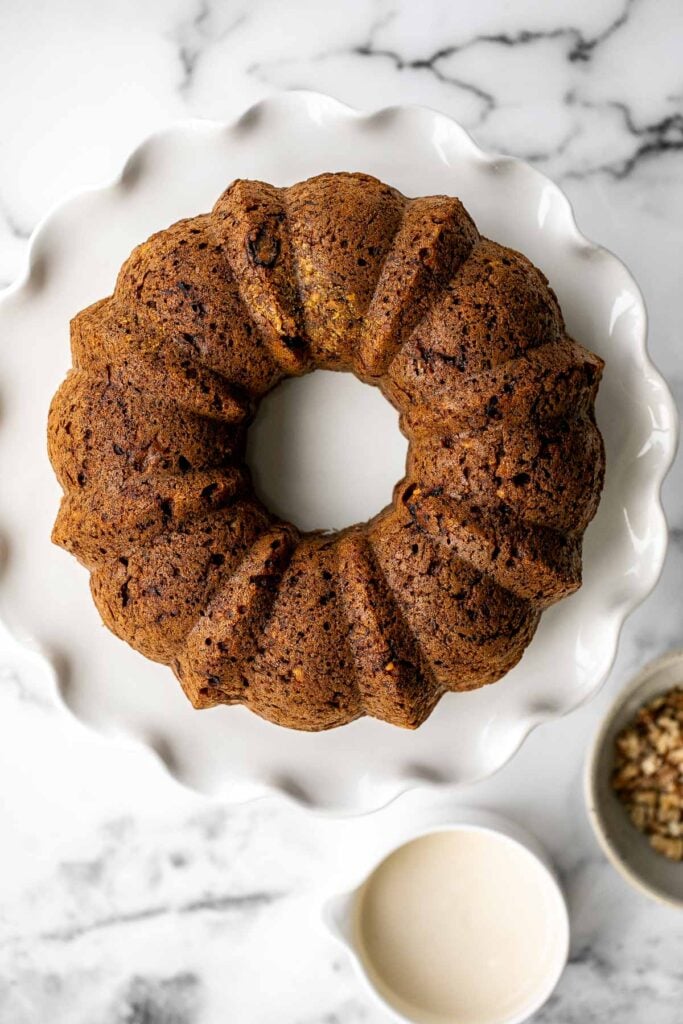 Showstopping carrot bundt cake with cream cheese glaze is light, fluffy, and moist. It's loaded with sugar, spice, and everything nice. | aheadofthyme.com