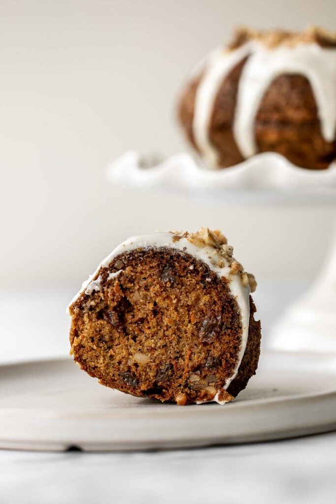 Showstopping carrot bundt cake with cream cheese glaze is light, fluffy, and moist. It's loaded with sugar, spice, and everything nice. | aheadofthyme.com