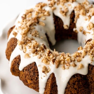 Showstopping carrot bundt cake with cream cheese glaze is light, fluffy, and moist. It's loaded with sugar, spice, and everything nice. | aheadofthyme.com