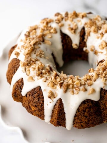 Showstopping carrot bundt cake with cream cheese glaze is light, fluffy, and moist. It's loaded with sugar, spice, and everything nice. | aheadofthyme.com