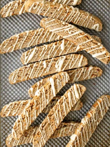 Carrot cake biscotti is crunchy, crumbly, and satisfies all your carrot cake cravings. Enjoy these Italian cookies as is or with white chocolate. | aheadofthyme.com