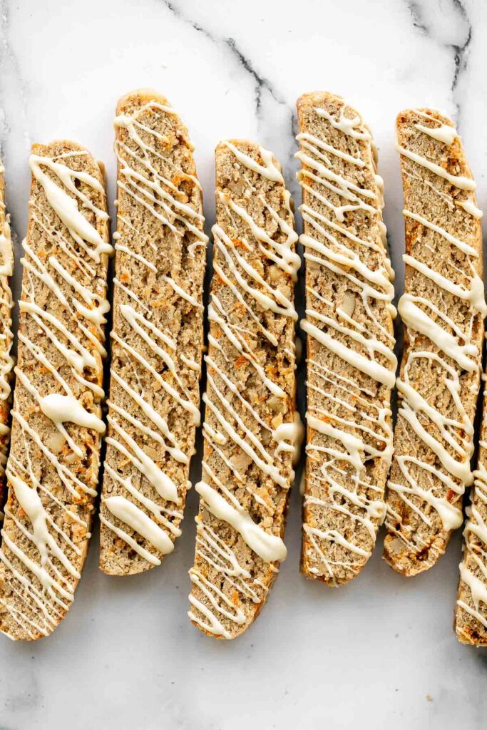 Carrot cake biscotti is crunchy, crumbly, and satisfies all your carrot cake cravings. Enjoy these Italian cookies as is or with white chocolate. | aheadofthyme.com