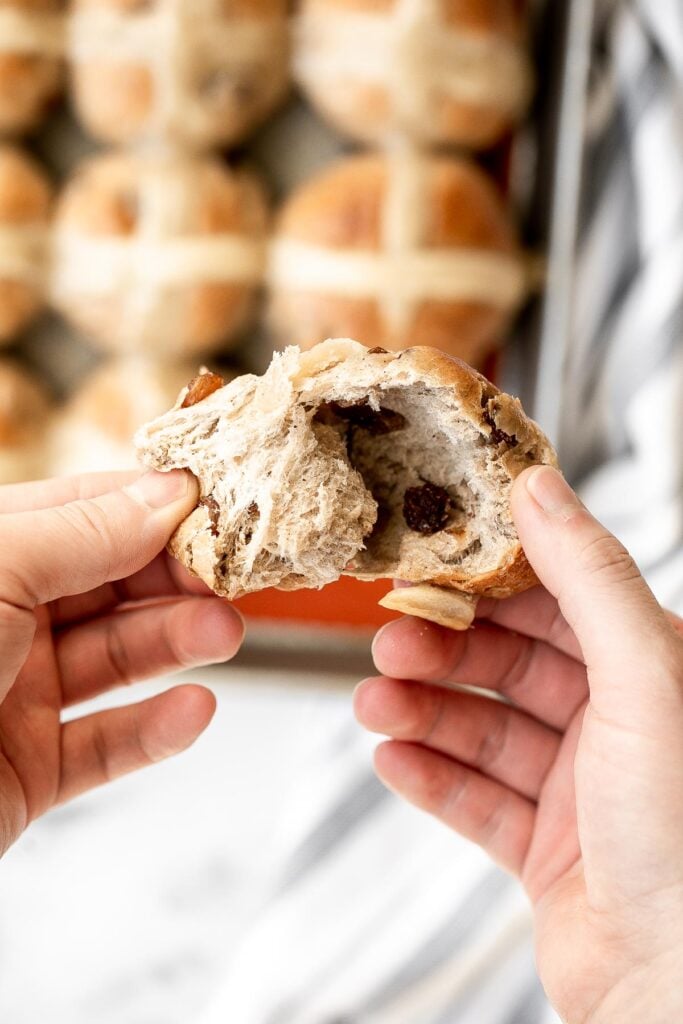 Hot cross buns is a timeless classic Easter bread made with raisins, cinnamon, and a honey glaze. They are perfect for breakfast, a snack or dessert. | aheadofthyme.com