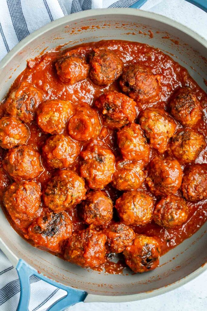 Quick, easy homemade Italian meatballs are juicy, flavourful, and delicious, simmered in a rich and savoury tomato sauce. Make them in just 30 minutes. | aheadofthyme.com