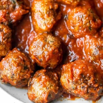 Quick, easy homemade Italian meatballs are juicy, flavourful, and delicious, simmered in a rich and savoury tomato sauce. Make them in just 30 minutes. | aheadofthyme.com