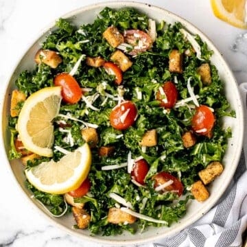Lemon kale salad is a simple, flavorful, and healthy meal that’s thrown together in just minutes with fresh ingredients. The perfect quick lunch or dinner. | aheadofthyme.com