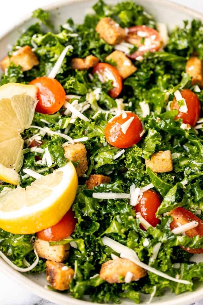 Lemon kale salad is a simple, flavorful, and healthy meal that’s thrown together in just minutes with fresh ingredients. The perfect quick lunch or dinner. | aheadofthyme.com