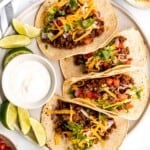 Ground beef tacos are delicious, authentic, and so easy to make. They're savory, spicy, creamy, and fresh. The perfect recipe for a Mexican fiesta. | aheadofthyme.com