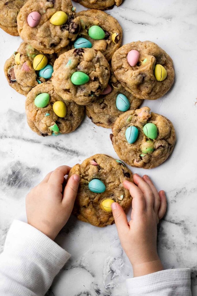 Mini egg Easter cookies are the perfect chocolate chip cookie -- crispy on the outside, and soft and chewy on the inside. Make in under 20 minutes. | aheadofthyme.com