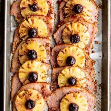 Sweet and savoury pineapple glazed ham slices are perfect for a holiday dinner. With a caramelized glaze, this ham is dressed to impress. | aheadofthyme.com