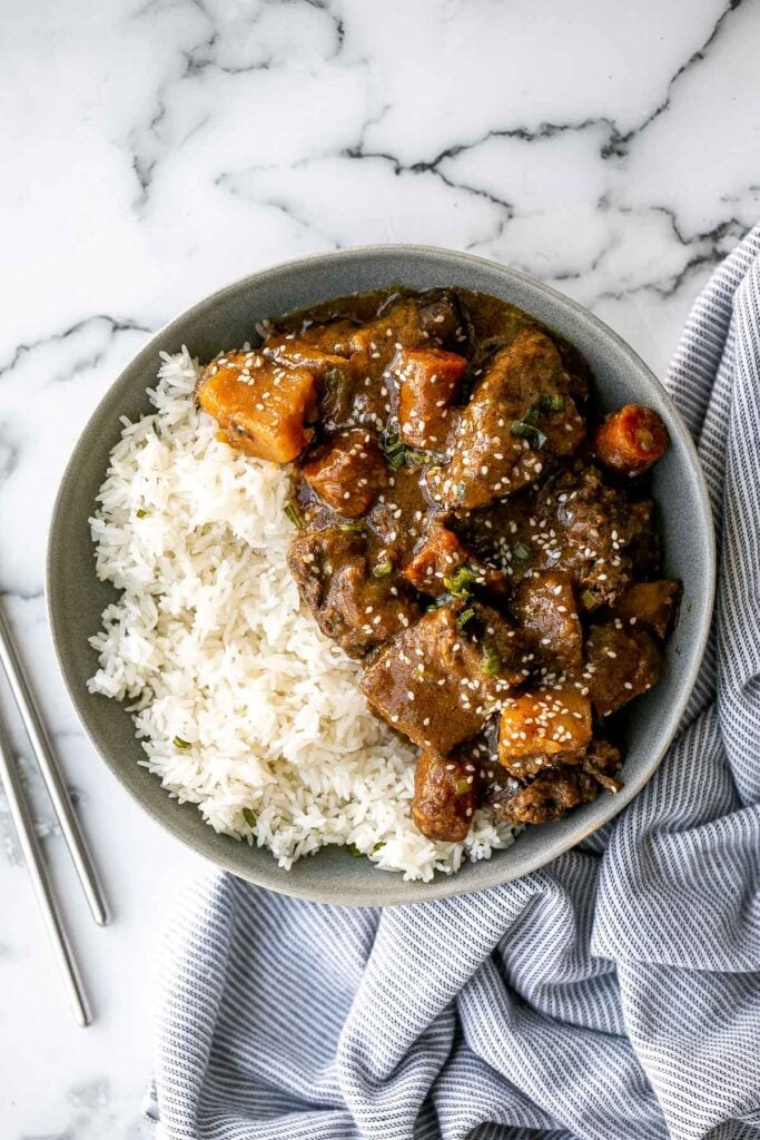 Slow cooker Korean short ribs deliver complex Asian flavours with little effort. Simply add your ingredients in the crockpot and let it cook dinner for you. | aheadofthyme.com