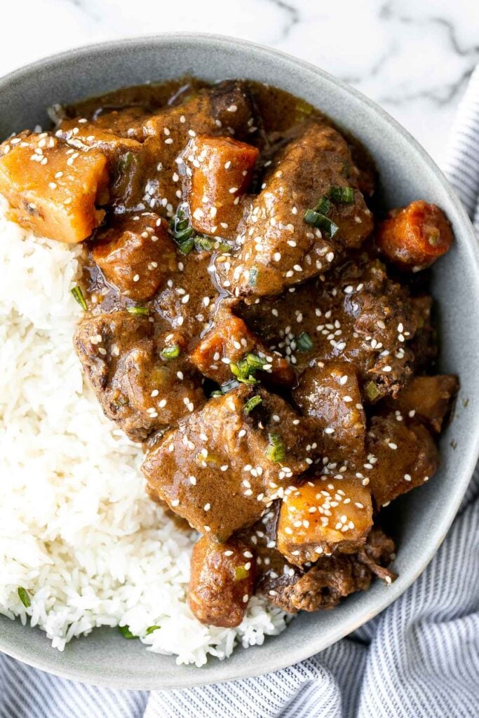 Slow cooker Korean short ribs deliver complex Asian flavours with little effort. Simply add your ingredients in the crockpot and let it cook dinner for you. | aheadofthyme.com