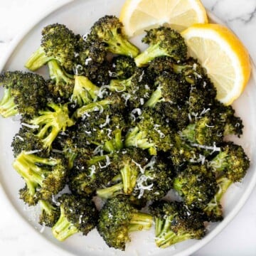 Quick and easy air fryer broccoli is a healthy side dish that takes just six minutes to cook in the air fryer. It's crispy, delicious, and flavorful. | aheadofthyme.com