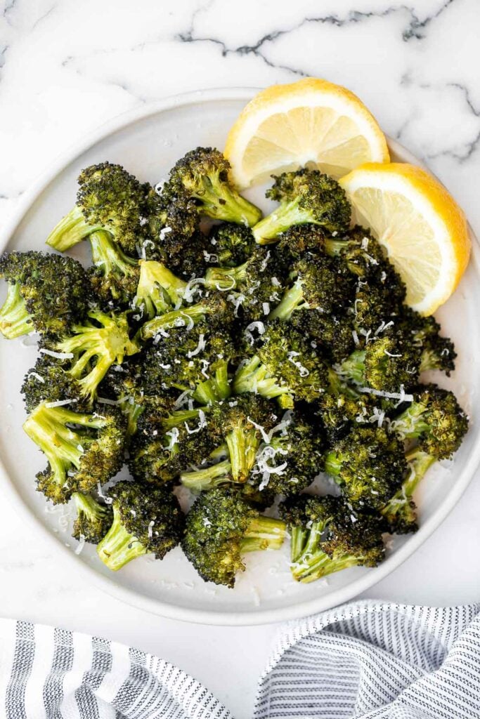 Quick and easy air fryer broccoli is a healthy side dish that takes just six minutes to cook in the air fryer. It's crispy, delicious, and flavorful. | aheadofthyme.com