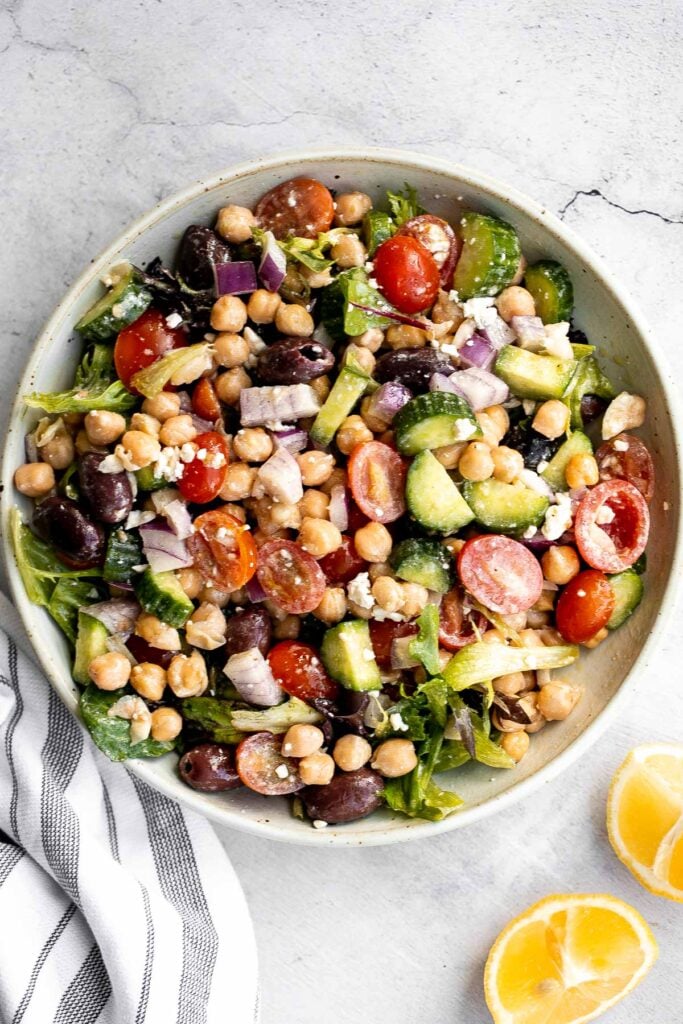 Chickpea Greek salad is a fresh, healthy, vibrant, and colorful salad, packed with traditional Mediterranean ingredients, superfoods, and nutrients. | aheadofthyme.com