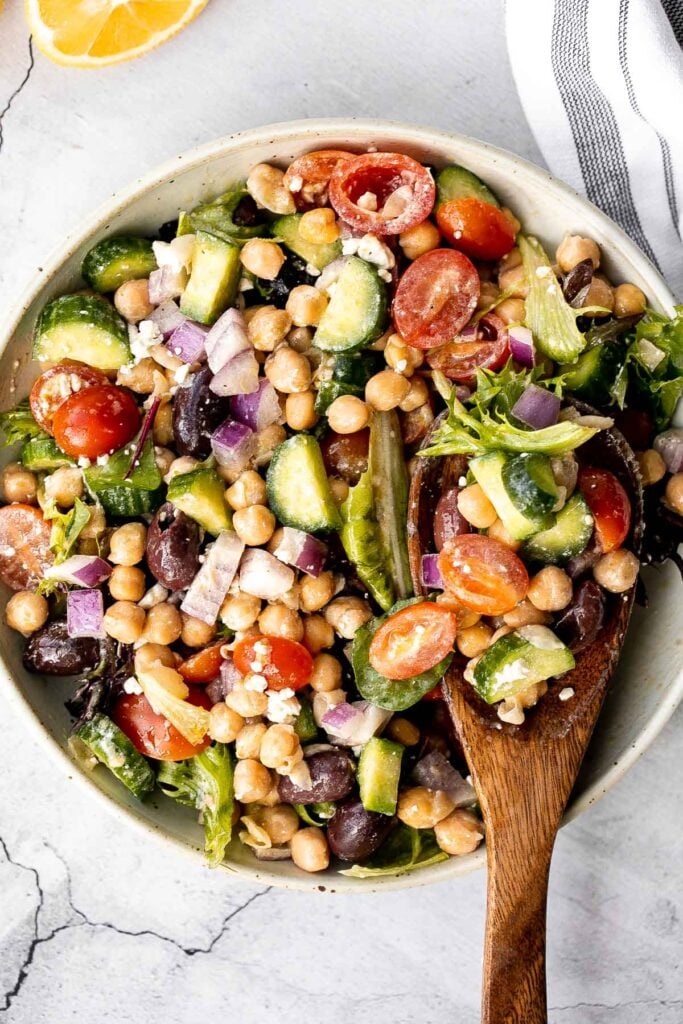 Chickpea Greek salad is a fresh, healthy, vibrant, and colorful salad, packed with traditional Mediterranean ingredients, superfoods, and nutrients. | aheadofthyme.com