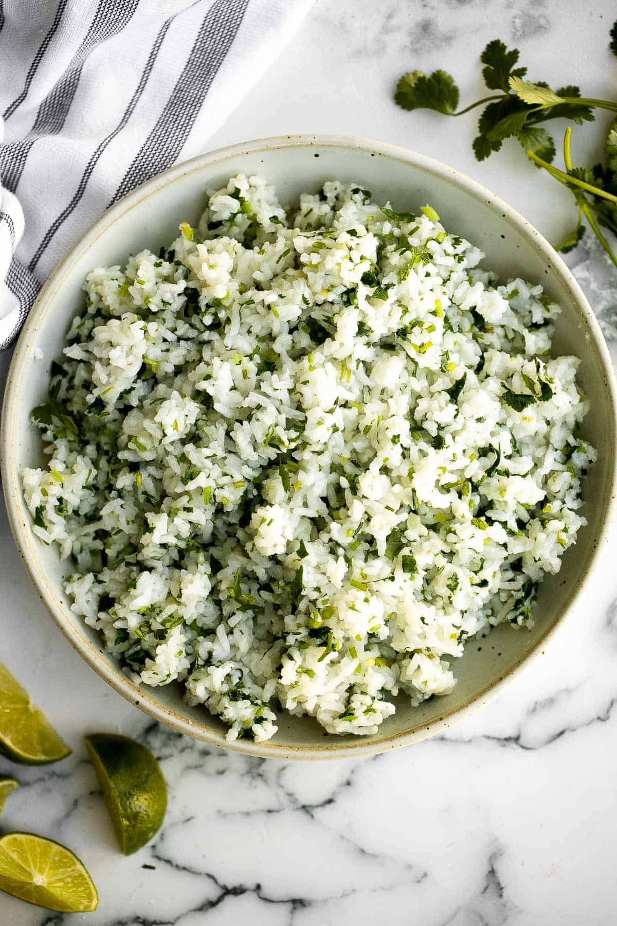 Cilantro lime rice is a fresh, bright and vibrant side dish that will add extra flavour to any meal you serve it with. It's a quick, easy, one pot recipe. | aheadofthyme.com