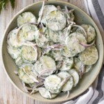 This creamy cucumber salad is the easy, refreshing snack and side dish your summer cookouts have been missing. Make it ahead with just 5 minutes prep. | aheadofthyme.com