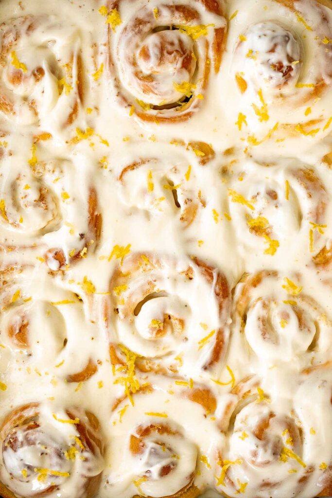 Soft and fluffy lemon sweet rolls are filled with a lemon vanilla sugar and topped with homemade lemon cream cheese icing. They're sweet, citrusy, and tart. | aheadofthyme.com
