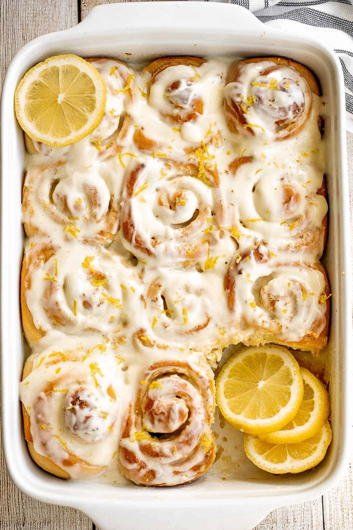 Soft and fluffy lemon sweet rolls are filled with a lemon vanilla sugar and topped with homemade lemon cream cheese icing. They're sweet, citrusy, and tart. | aheadofthyme.com