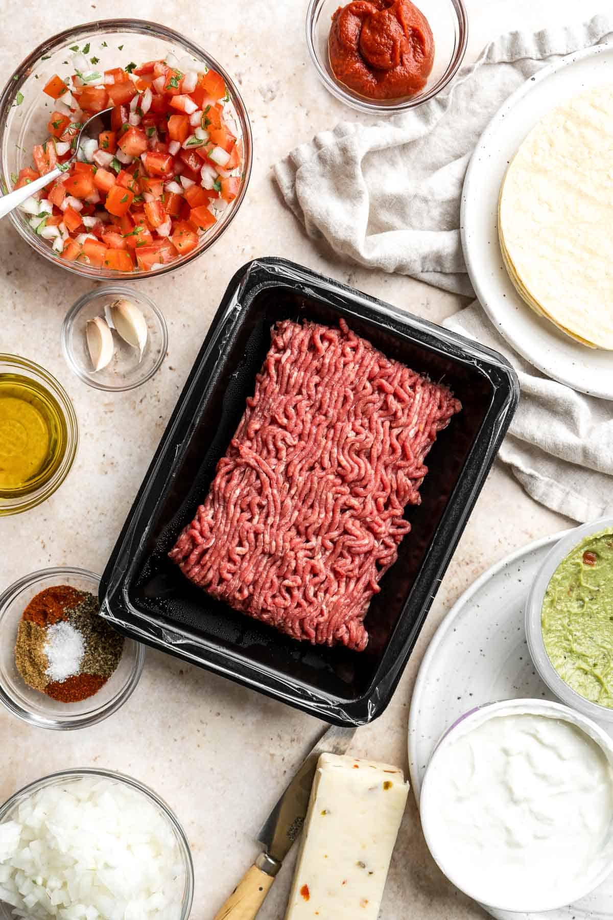 Spice up Taco Tuesday with these delicious, authentic, and easy-to-make Mexican ground beef tacos. Perfect for a quick weeknight dinner or a fiesta! | aheadofthyme.com