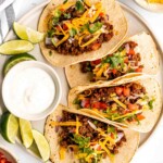 Spice up Taco Tuesday with these delicious, authentic, and easy-to-make Mexican ground beef tacos. Perfect for a quick weeknight dinner or a fiesta! | aheadofthyme.com