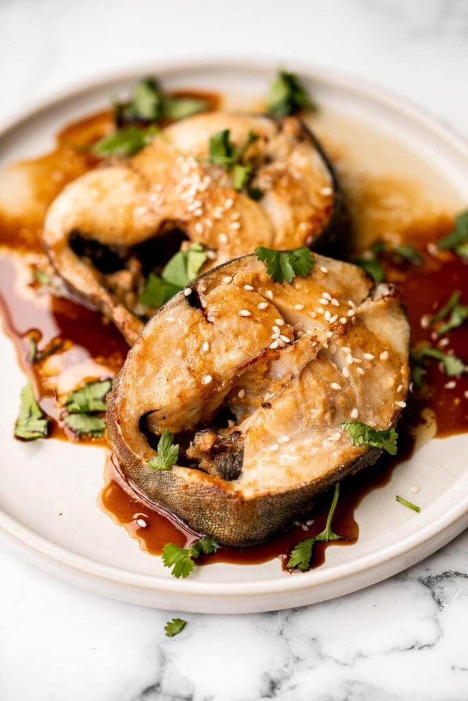 Flaky, oily, and tender, miso black cod (or sablefish) packed with delicious Asian flavours is an indulgent meal that’s as healthy as it is delicious. | aheadofthyme.com