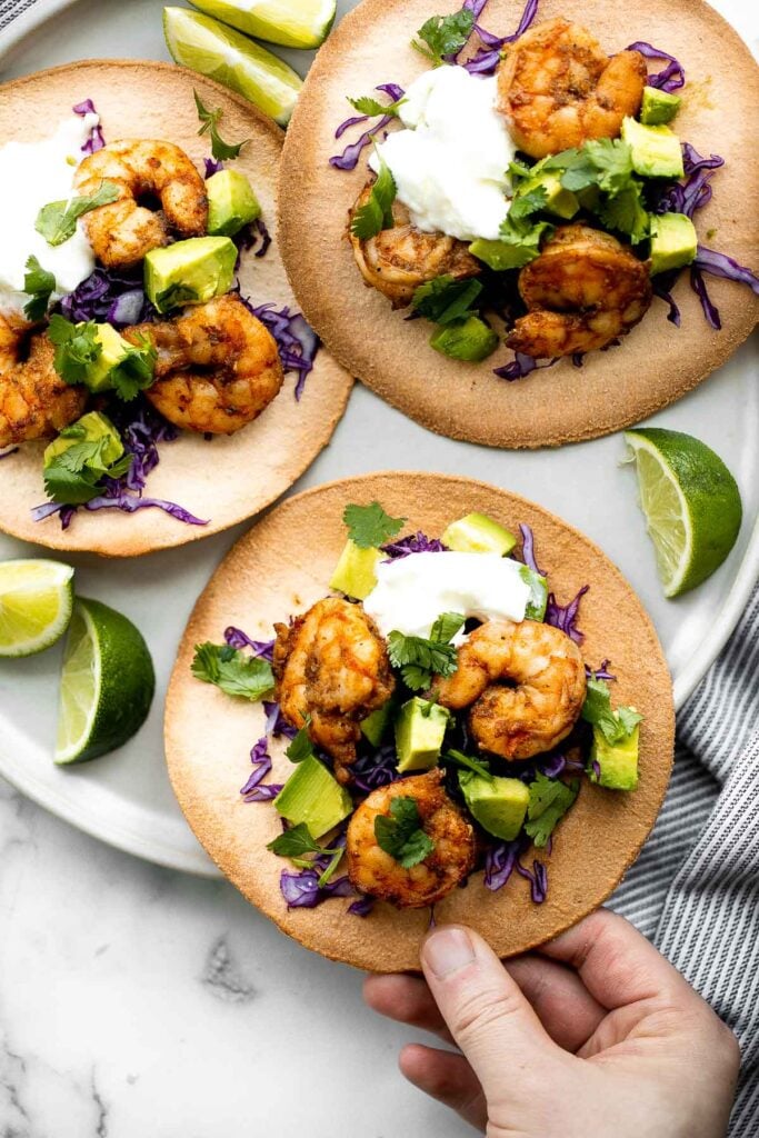 Shrimp avocado tostadas are a delicious, crunchy, quick and easy Mexican dish you can make in just 15 minutes, loaded with the best combination of toppings. | aheadofthyme.com