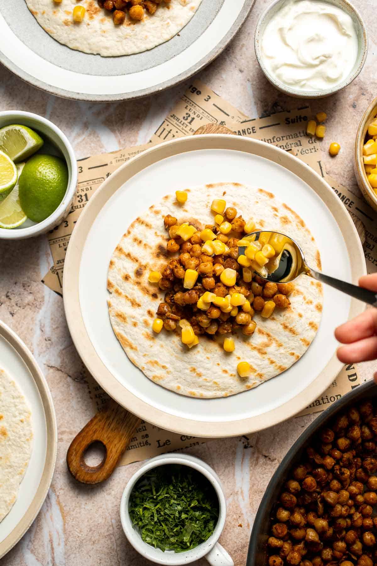 Healthy vegan chickpea taco topped with corn.