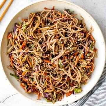 There’s nothing better on a hot day than a cold and refreshing vegan soba noodle salad, tossed with fresh vegetables and a delicious saucy dressing. | aheadofthyme.com