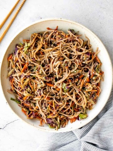 There’s nothing better on a hot day than a cold and refreshing vegan soba noodle salad, tossed with fresh vegetables and a delicious saucy dressing. | aheadofthyme.com