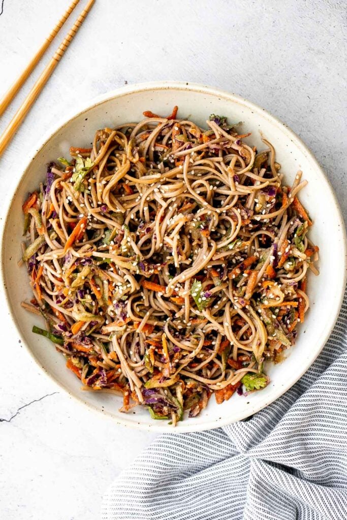 There’s nothing better on a hot day than a cold and refreshing vegan soba noodle salad, tossed with fresh vegetables and a delicious saucy dressing. | aheadofthyme.com