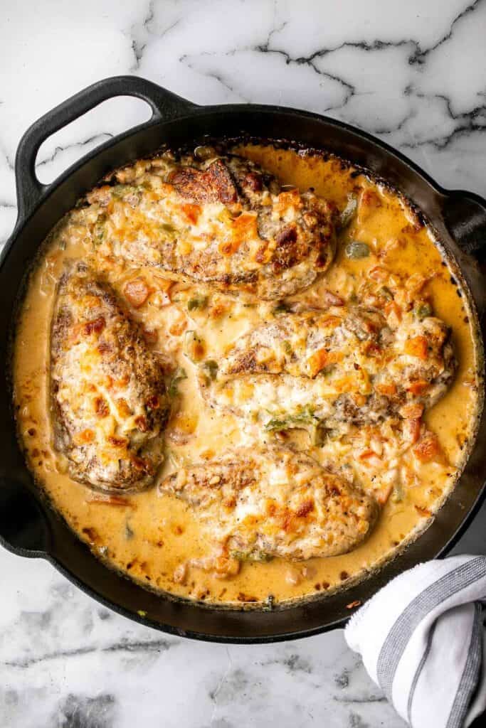 Baked queso chicken with tomatoes is an easy, cheesy, delicious chicken dinner that takes just 30 minutes to cook. The best weeknight dinner. | aheadofthyme.com