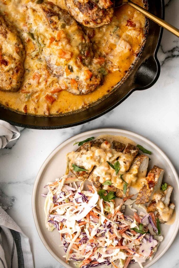 Baked queso chicken with tomatoes is an easy, cheesy, delicious chicken dinner that takes just 30 minutes to cook. The best weeknight dinner. | aheadofthyme.com