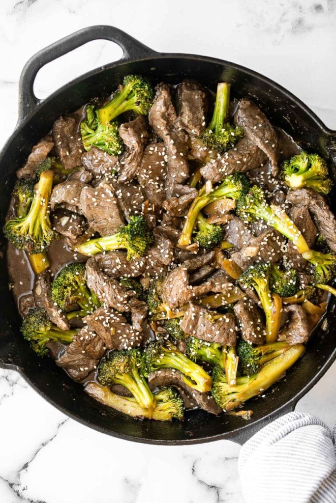Beef and broccoli stir fry is a classic Chinese-American dish that is delicious, savory, hearty, and saucy. Better than takeout and ready in 25 minutes. | aheadofthyme.com