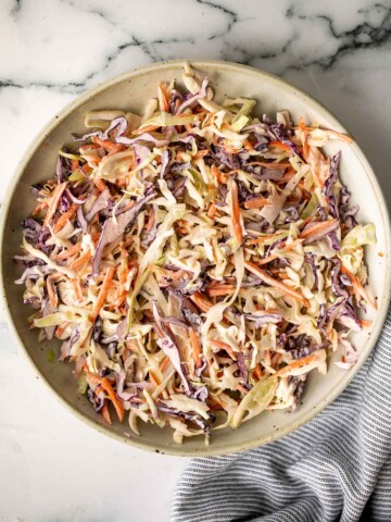 Fresh, crisp, classic coleslaw salad is a must-have recipe for a summer barbecue or picnic, or as an easy make-ahead lunch. Make it in less than 10 minutes. | aheadofthyme.com