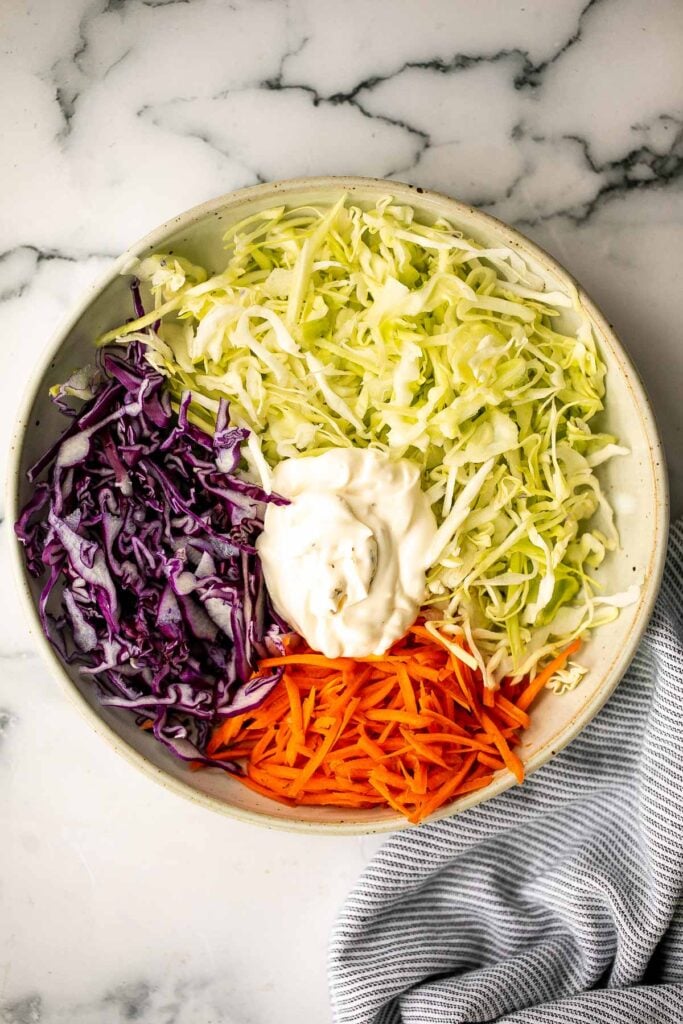 Fresh, crisp, classic coleslaw salad is a must-have recipe for a summer barbecue or picnic, or as an easy make-ahead lunch. Make it in less than 10 minutes. | aheadofthyme.com