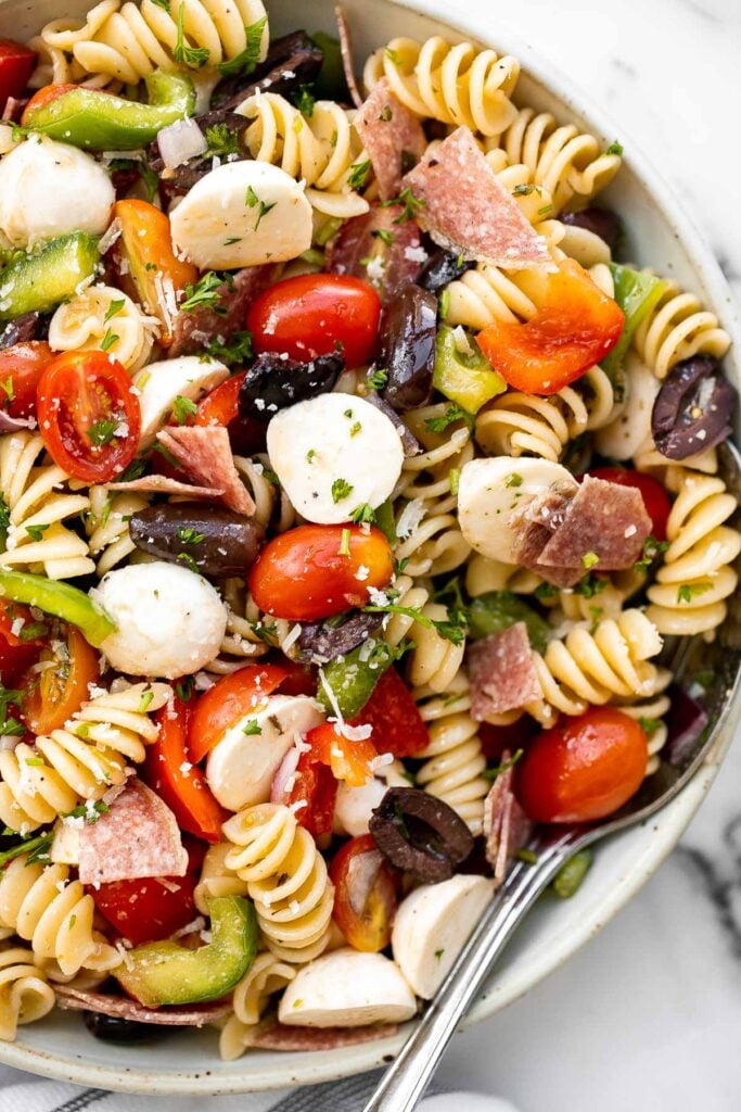 Italian pasta salad is delicious, wholesome, and easy to make. Make it up to three days ahead for your summer picnics and cookouts. | aheadofthyme.com