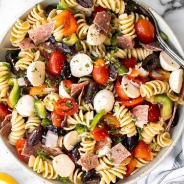 Italian pasta salad is delicious, wholesome, and easy to make. Make it up to three days ahead for your summer picnics and cookouts. | aheadofthyme.com