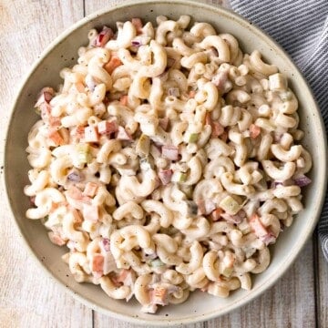 Classic macaroni salad is a creamy and delicious pasta salad that is easy to throw together. It's the perfect side to bring to a summer potluck or BBQ. | aheadofthyme.com