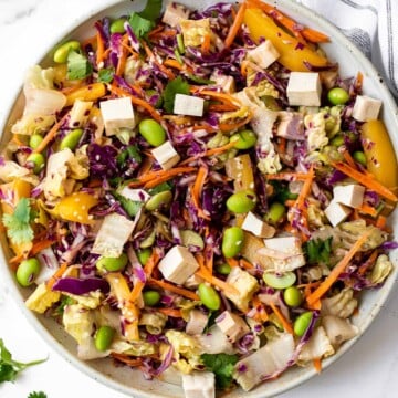 Asian chopped salad is a delicious and colorful salad, loaded with refreshing crisp vegetables, plant-based protein, and a homemade creamy sesame dressing. | aheadofthyme.com