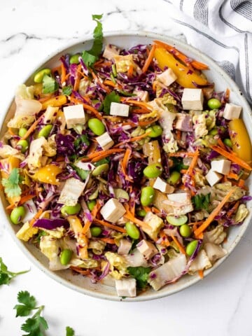 Asian chopped salad is a delicious and colorful salad, loaded with refreshing crisp vegetables, plant-based protein, and a homemade creamy sesame dressing. | aheadofthyme.com