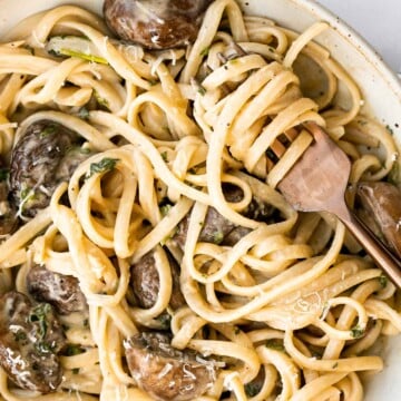 Creamy mushroom pasta is packed with buttery garlicky mushrooms swimming in a delicious creamy Parmesan sauce. Quick and easy make in 20 minutes. | aheadofthyme.com
