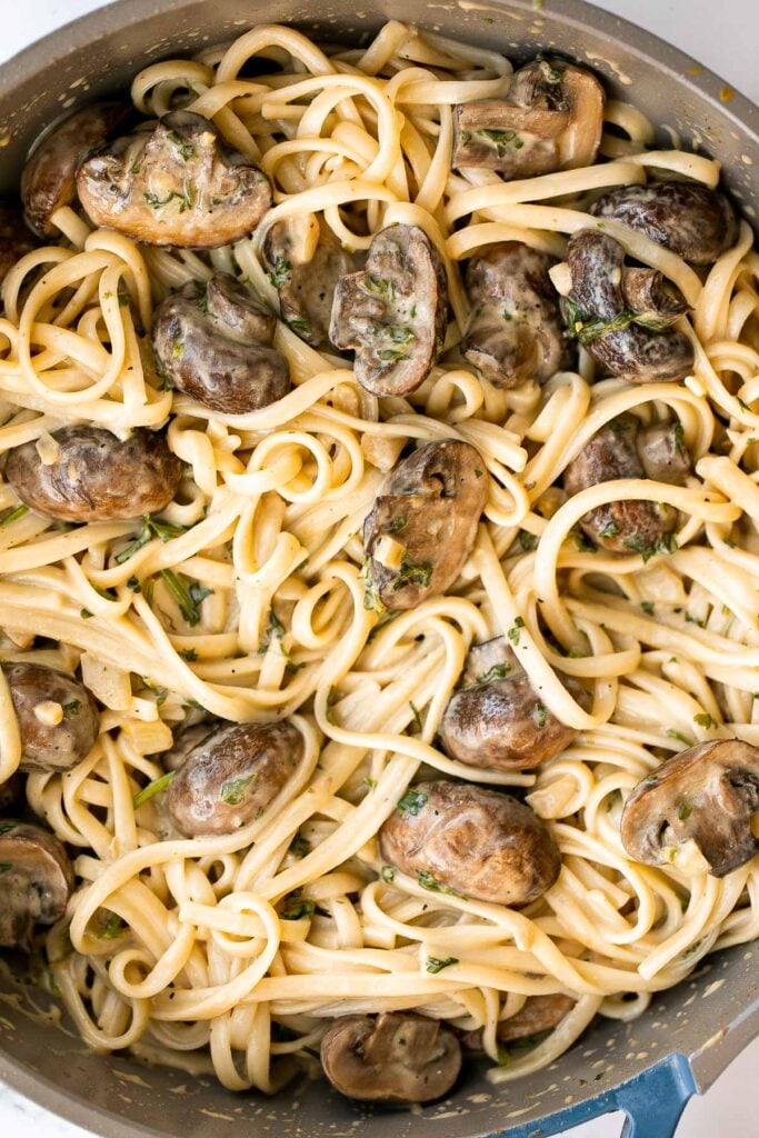 Creamy mushroom pasta is packed with buttery garlicky mushrooms swimming in a delicious creamy Parmesan sauce. Quick and easy make in 20 minutes. | aheadofthyme.com